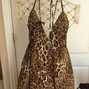 Leopard goddess dress. Ties in halter  with low back. Maxi ruffles